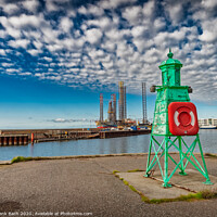 Buy canvas prints of Retro lighthouse at the entrance to Esbjerg harbor, Denmark by Frank Bach