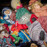 Buy canvas prints of Worn out dolls puppets  on a flea market in Rome, Italy by Frank Bach