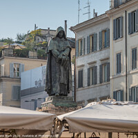 Buy canvas prints of Giordano Bruno statue watching Campo dei Fiori in Rome where he  by Frank Bach