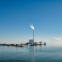 Buy canvas prints of Wind power rigs in Esbjerg harbor. Denmark by Frank Bach