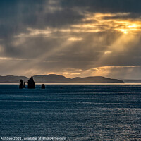 Buy canvas prints of Dramatic sky lights up the Drongs, Shetland by Richard Ashbee