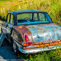 Buy canvas prints of An old vintage car rusting in a Shetland farm by Richard Ashbee
