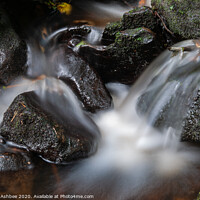 Buy canvas prints of Long exposure of a fast flowing River Rivelin near by Richard Ashbee