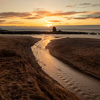 Buy canvas prints of Sun setting behind the rock at Thurlestone. by Richard Fearon