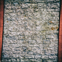 Buy canvas prints of Crooked and abstract old brick wall between red concrete by Ingo Menhard