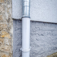 Buy canvas prints of Closeup shot of a gutter on the edge of a house by Ingo Menhard