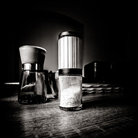 Buy canvas prints of Closeup grayscale of a salt shaker on the wooden surface by Ingo Menhard