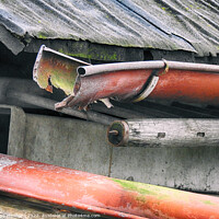 Buy canvas prints of Closeup shot of a rusty pipe under the weathered roof by Ingo Menhard