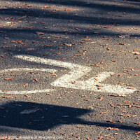 Buy canvas prints of Closeup shot of a wheelchair sign painted on the road by Ingo Menhard
