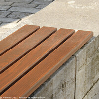 Buy canvas prints of A part of a wooden bench in the park by Ingo Menhard
