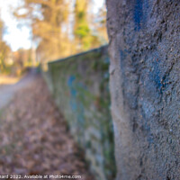 Buy canvas prints of Closeup shot of a stone fence texture in a park by Ingo Menhard