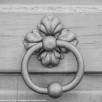 Buy canvas prints of A closeup shot of an old metal doorknob on a wooden door by Ingo Menhard