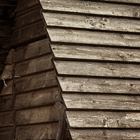 Buy canvas prints of Vertical shot of a roof of a wooden building by Ingo Menhard