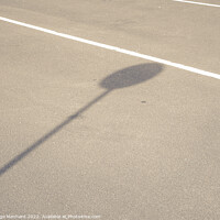 Buy canvas prints of A road with white line-markings and a sign shadow by Ingo Menhard
