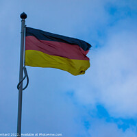 Buy canvas prints of Low angle shot of a German flag waving in the sky by Ingo Menhard