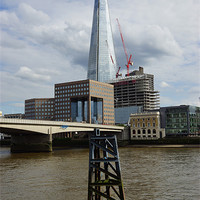 Buy canvas prints of The Shard and the Thames by Alan Jacobs