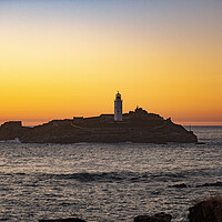 Buy canvas prints of Godrevy Lighthuse at Sunset by Ian Whitcombe