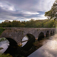 Buy canvas prints of Eight Arch Bridge at Bosherston Lily Ponds by Tracey Turner