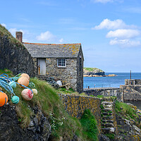 Buy canvas prints of The Old Cottage at Mullion Harbour in Cornwall by Tracey Turner