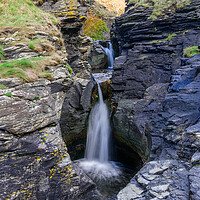Buy canvas prints of Waterfall at Rocky Valley, near Bossiney Haven in Cornwall by Tracey Turner