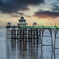 Buy canvas prints of Clevedon Pier with a Moody Sunset Sky by Tracey Turner