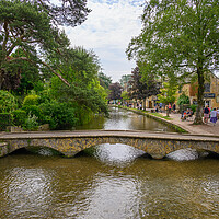 Buy canvas prints of Bourton on the Water famous stone bridge by Tracey Turner