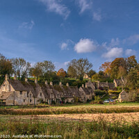 Buy canvas prints of Autumnal Bibury Cottages, Arlington Row by Tracey Turner