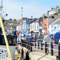 Buy canvas prints of Brixham seafront in Devon. by john hill