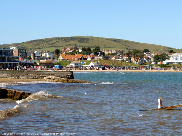 Swanage bay and seafront in Dorset, UK. Picture Board by john hill