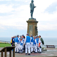 Buy canvas prints of Morris dancers rest break at Whitby. by john hill