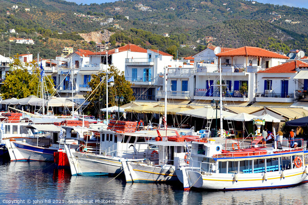 Ferries in the old port at Skiathos in Greece. Picture Board by john hill