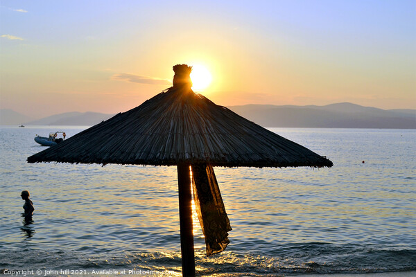 Sunset at Ag Eleni beach at Skiathos in Greece Picture Board by john hill