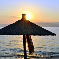 Buy canvas prints of Sunset at Ag Eleni beach at Skiathos in Greece by john hill