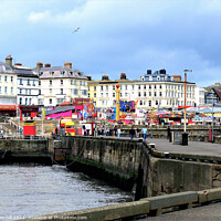 Buy canvas prints of Fun Fair on the harbor at Bridlington, Yorkshire, UK. by john hill