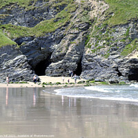 Buy canvas prints of Exploring caves on Portreath beach. by john hill