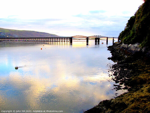 Barmouth Bridge at dusk in Gwynedd, Wales. Picture Board by john hill