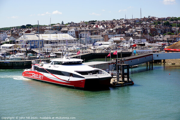 Red jet ferry at West Cowes on the Isle of Wight. Picture Board by john hill
