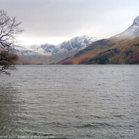 Buy canvas prints of Snow Capped mountains at Buttermere Lake by john hill