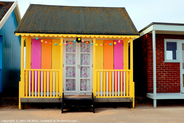 Colorful beach hut. Picture Board by john hill