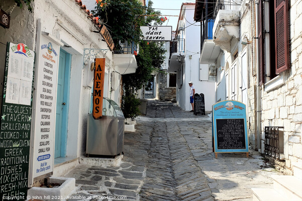The oldest Tavern, Skiathos town, Skiathos, Greece. Picture Board by john hill