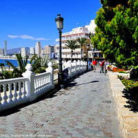 Buy canvas prints of Walkway on the seafront at Benidorm, Spain. by john hill