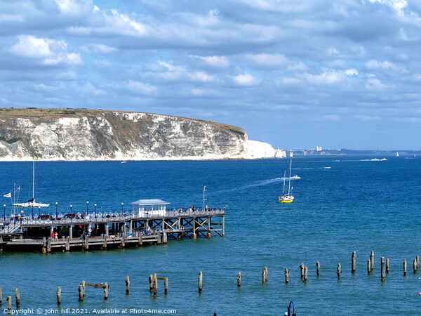 Old  & New piers, Swanage, Dorset. Picture Board by john hill