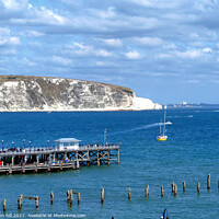 Buy canvas prints of Old  & New piers, Swanage, Dorset. by john hill