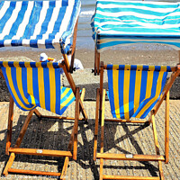 Buy canvas prints of Sunshade deckchairs, Shanklin, Isle of Wight, UK. by john hill