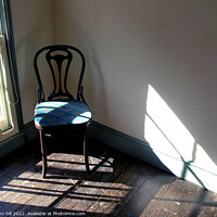 Buy canvas prints of Chair in a empty room. by john hill