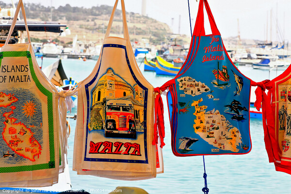 Souvenir aprons at Malta Picture Board by john hill