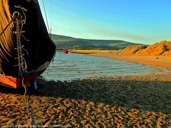 Beached boat, Barmouth, Wales. Picture Board by john hill