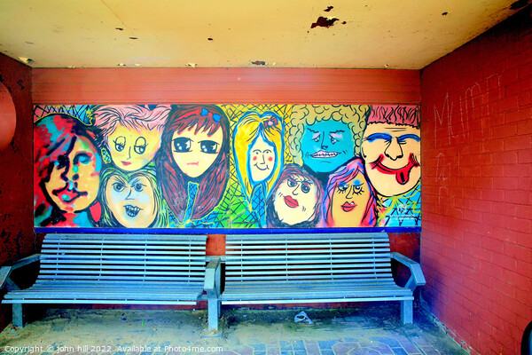 Street art in a seaside shelter. Picture Board by john hill
