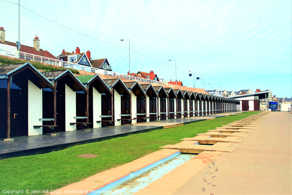 Beach huts in perspective. Picture Board by john hill