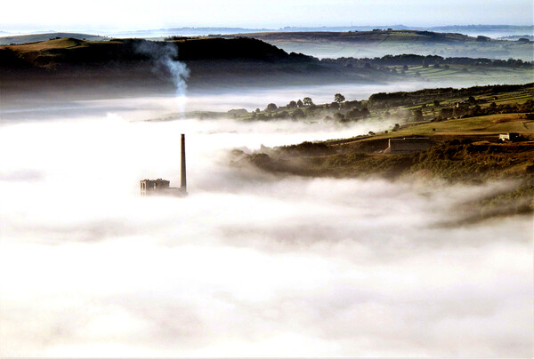 Chimney in the mist. Picture Board by john hill